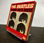 The Beatles Hard Days Night Vintage Vinyl Record Cover on Rack Stand Displayed by Officine Minimale